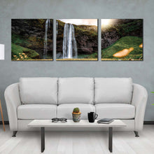 Load image into Gallery viewer, rainforest  waterfall  canvas  wall  art  seljalandsfoss  falls  green  nature  canvas  print  yellow  sunset  iceland  landscape  waterfall  3  piece  canvas  set In Living Room
