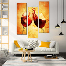 Load image into Gallery viewer, red  wine  glasses  toasts  isolated  on  orange  yellow  background  triptych  wall  art In Living Room
