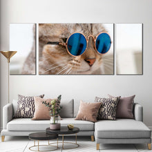 Load image into Gallery viewer, smart cat canvas wall art brown cat close up 3 piece canvas print cat wearing blue sunglasses multi canvas In Living Room
