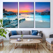 Load image into Gallery viewer, stony beach canvas wall art yellow sky ocean rocks sea 3 piece canvas print blue ocean water triptych multi canvas For Living Room
