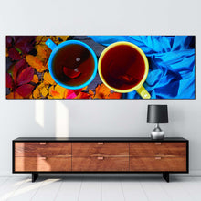 Load image into Gallery viewer, tea  cups  canvas  print  blue  yellow  tea  cups  close  up  panoramic  canvas  wall  art  tea  from  above  canvas  artwork In Living Room
