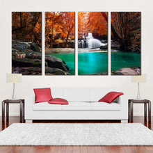 Load image into Gallery viewer, thailand waterfall canvas wall art exotic waterfall in orange forest 4 piece canvas print mae kamin waterfall canvas set blue water scenery multi canvas In Living Room
