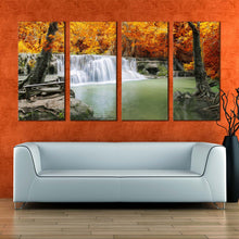 Load image into Gallery viewer, thailand waterfall canvas wall art green lake river canvas print orange autumn trees forest waterfall 4 piece canvas set In Living room
