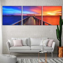 Load image into Gallery viewer, timber  pier  landscape  sea  sky  clouds  view  triptych  wall  art In Living Room
