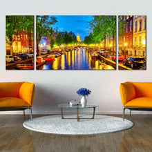 Load image into Gallery viewer, triptych canvas of amsterdam city lights at Night Reflecting in the Canal In Living Room
