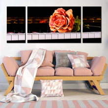 Load image into Gallery viewer, vintage rose canvas wall art isolated pink rose 3 piece canvas print white black piano keyboard triptych canvas set In Living Room
