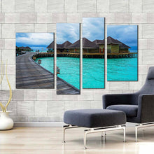 Load image into Gallery viewer, water villa canvas wall art blue ocean wooden bridge 4 piece canvas print brown hotel on water multiple canvas for living room
