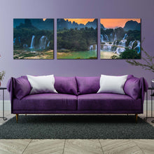 Load image into Gallery viewer, waterfall  scenery  canvas  wall  art  green  vietnam  landscape  banyue  waterfall  3  piece  canvas  set  detian  waterfall  guangxi  orange  sunset  triptych  canvas  print In Living Room
