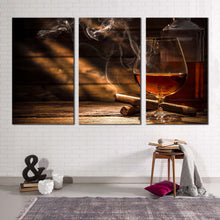 Load image into Gallery viewer, whiskey cigar canvas print orange glass of whiskey triptych canvas set whiskey on brown wooden table 3 piece canvas wall art
