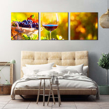 Load image into Gallery viewer, wine  fruits  canvas  wall  art  glass  of  wine  at  sunset  multiple  canvas  wine  in  yellow  autumn  canvas  set  colorful  wine  and  grapes  3  piece  canvas  print In Bedroom
