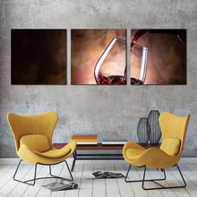 Load image into Gallery viewer, wine  glass  canvas  print  red  wine  pouring  close  up  3  piece  canvas  wall  art  black  wine  bottle  multi  canvas  artwork In Living Room
