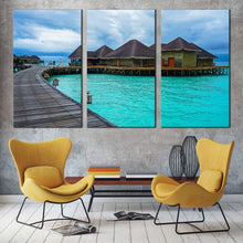 Load image into Gallery viewer, wooden bridge canvas wall art blue water villa 3 piece canvas set maldives hotel on water triptych canvas print For Living Room
